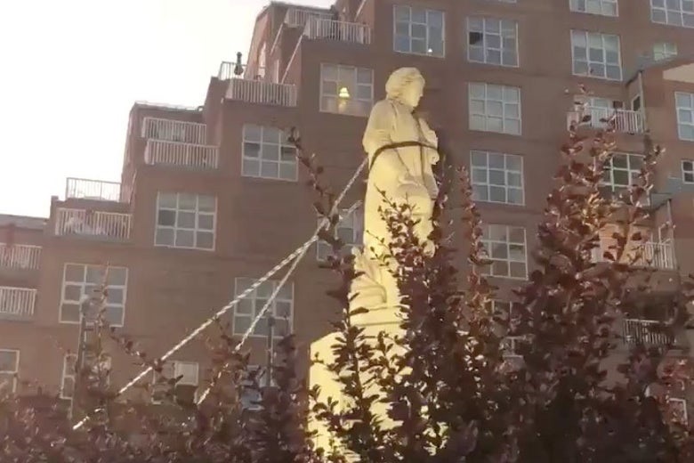 Columbus statue in Baltimore torn down and thrown in harbor