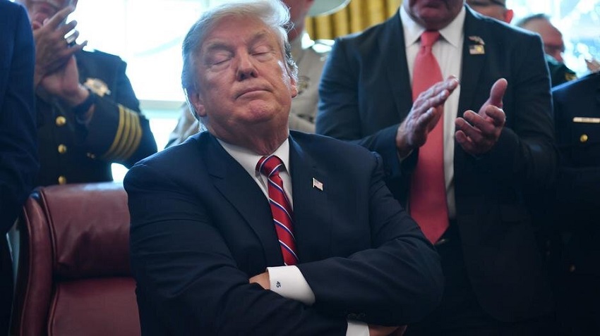 Trump denies coronavirus is on “hunch”