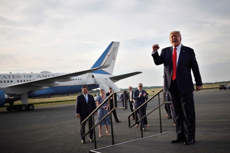 Trump tries to shore up Florida, Biden targets Michigan as early voting surges