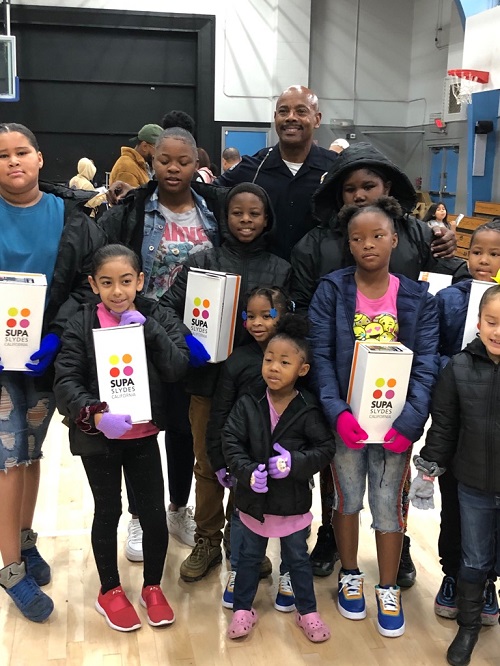 Coat giveaway for children in Greece