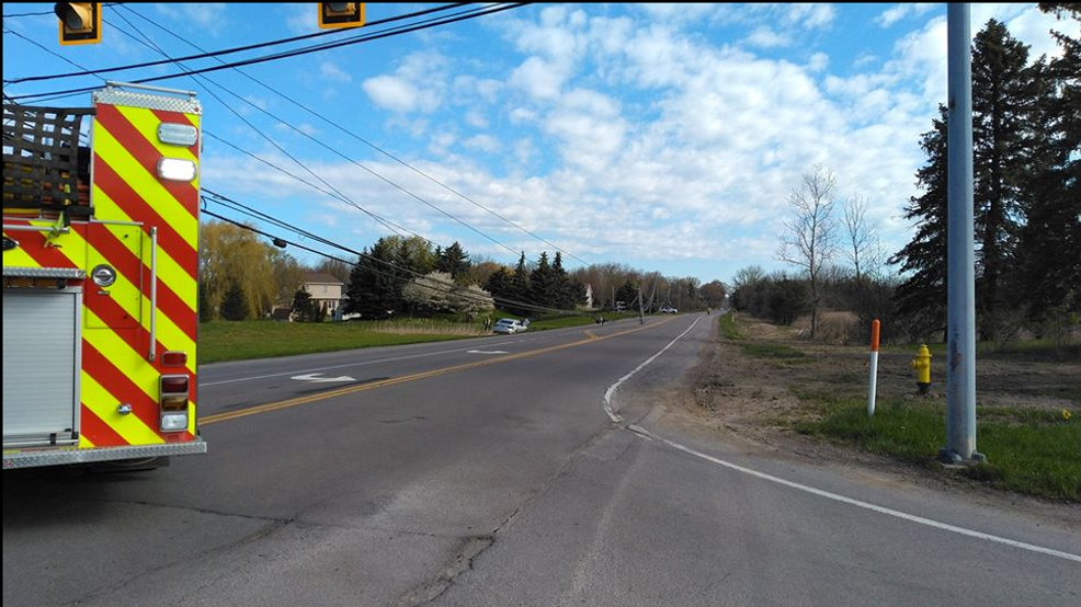 Person detained after car slams into pole in Henrietta, takes down power lines