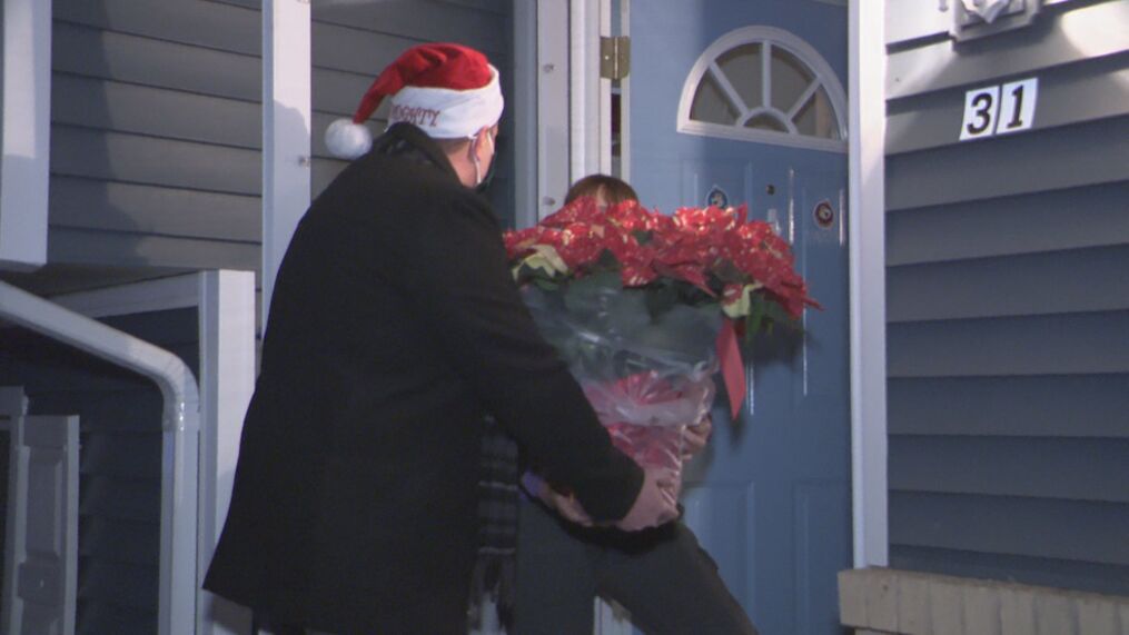 Gates Police Hand Out Christmas Poinsettias Weeks After Noel Drive Explosion