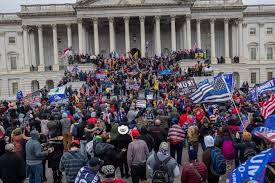 NY college student arrested in Capitol riot as cases grow