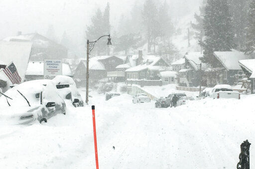 Atmospheric river storm drenches California, snow piles high