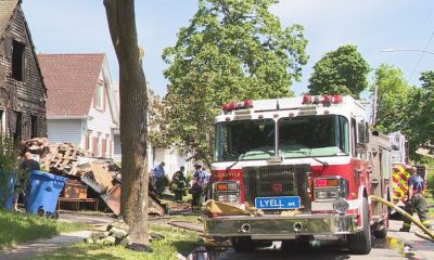 Three Rochester Police officers rescue several people from burning home