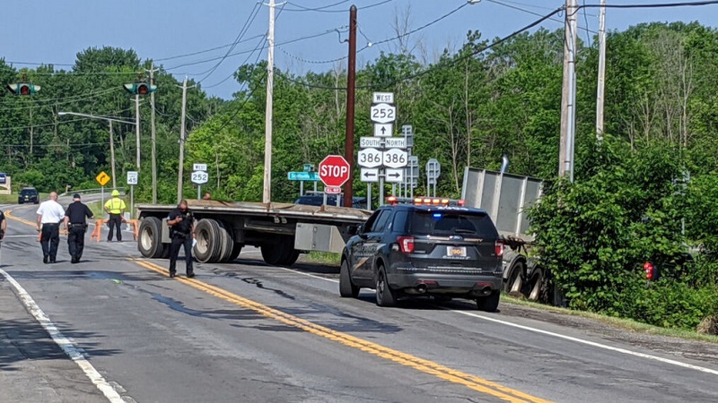 One person is death after two-vehicle crash with tractor-trailer