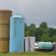 Two people trapped inside a tank, one man died