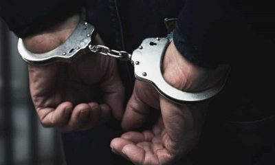 A man taken into custody after trying to stab an officer with a knife