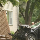 SUV crashes into pole, house in Penfield