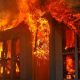 Heavy flames coming from the roof of a Webster home
