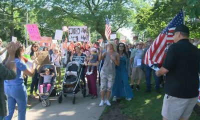 Protesters against mandatory vaccines in Rochester