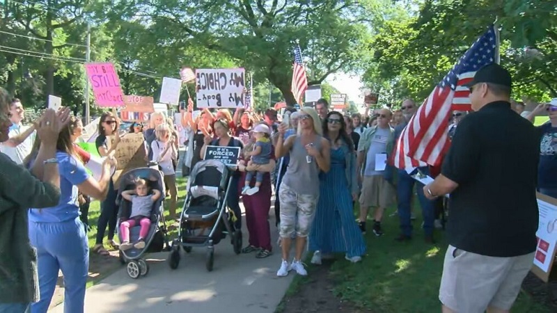 Protesters against mandatory vaccines in Rochester