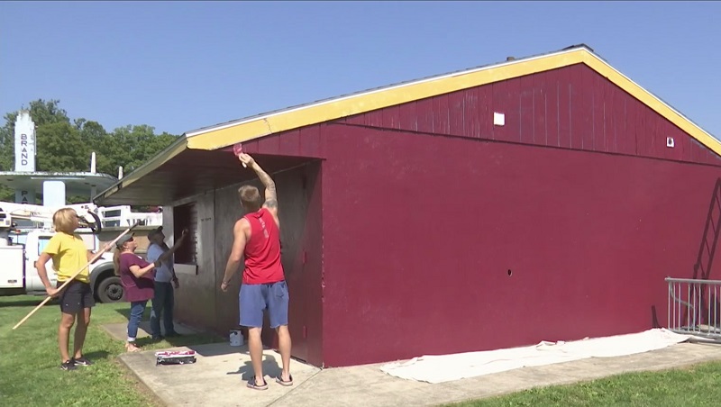 Volunteers gave a new look to a local concessions stand Volunteers gave a new look to a local concessions stand