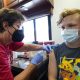 US health officials call for booster shots against COVID-19