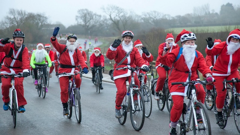 Dozens of Santas cycling to benefit The Center for Youth Dozens of Santas cycling to benefit The Center for Youth