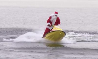 Jet Ski Santa rides the waves of Irondequoit Bay