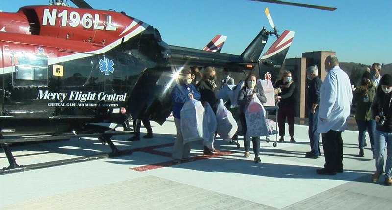 Mercy Flight Central delivers holiday toys to Golisano Children’s Hospital