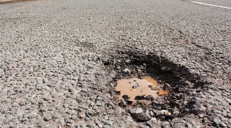 American Automobile Association offers tips to protect yourself from pothole damage