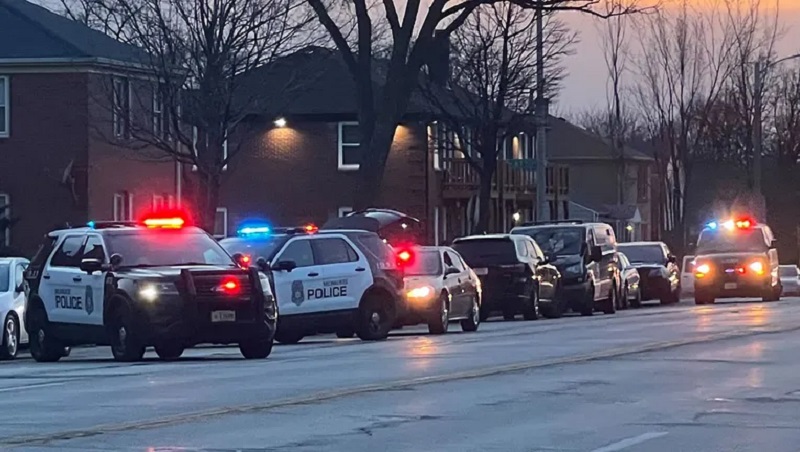 Community members and police respond to the city’s 66th homicide of the year