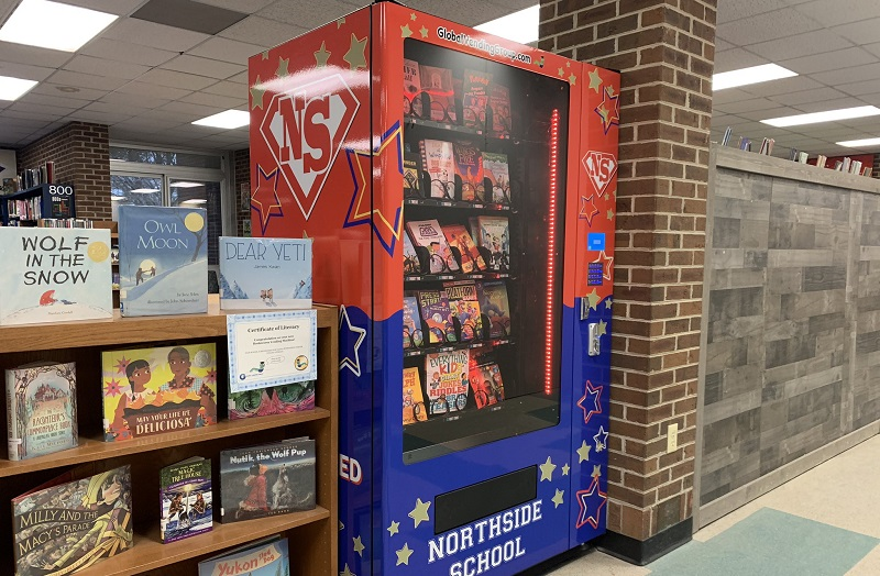 Students in one Fairport school can now buy books from a book vending machine installed at the school Students in one Fairport school can now buy books from a book vending machine installed at the school