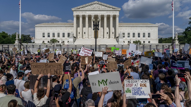 Protesters demonstrate against the possibility of a ban on abortion drugs as the Supreme Court gets ready to hear the case