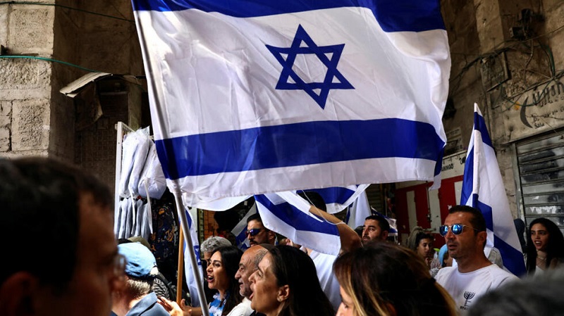 Group demand that the Israeli flag be taken down from the office building in Monroe County, while others provide different perspectives