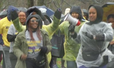 Numerous people walk to bring attention to Black maternal mortality