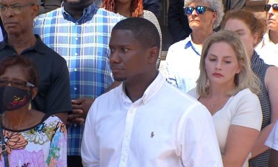 A settlement about a racist party is reached between the City of Rochester and a former firefighter