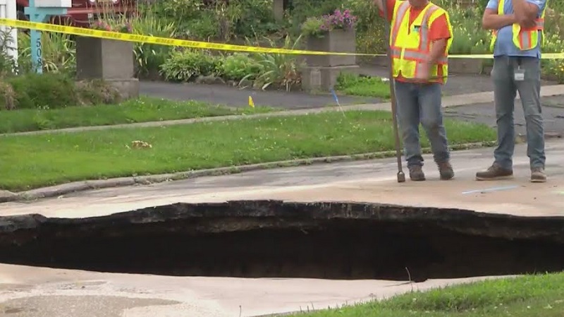 East Rochester Street is closed due to a massive sinkhole