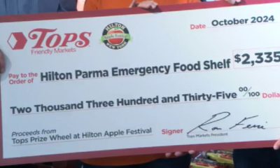 Tops donates K from Apple Fest to Hilton-Parma food shelf