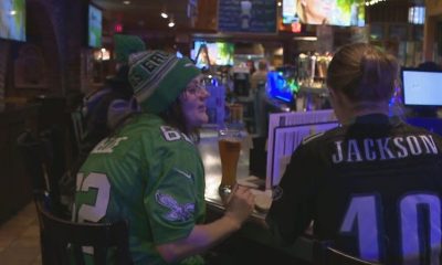 At a local hotspot, Rochester Eagles supporters celebrate their team’s Super Bowl triumph over the Chiefs